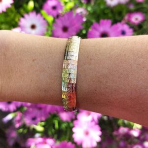 Bracelet ruban trois ors 14k, lamelles articulées ciselées