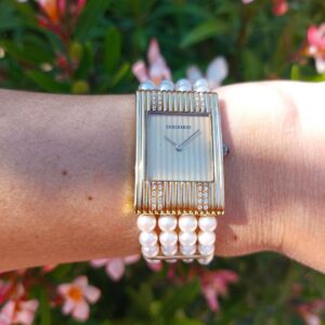 Montre Boucheron « Reflet » or 18k et diamants — full set avec sept bracelets interchangeables