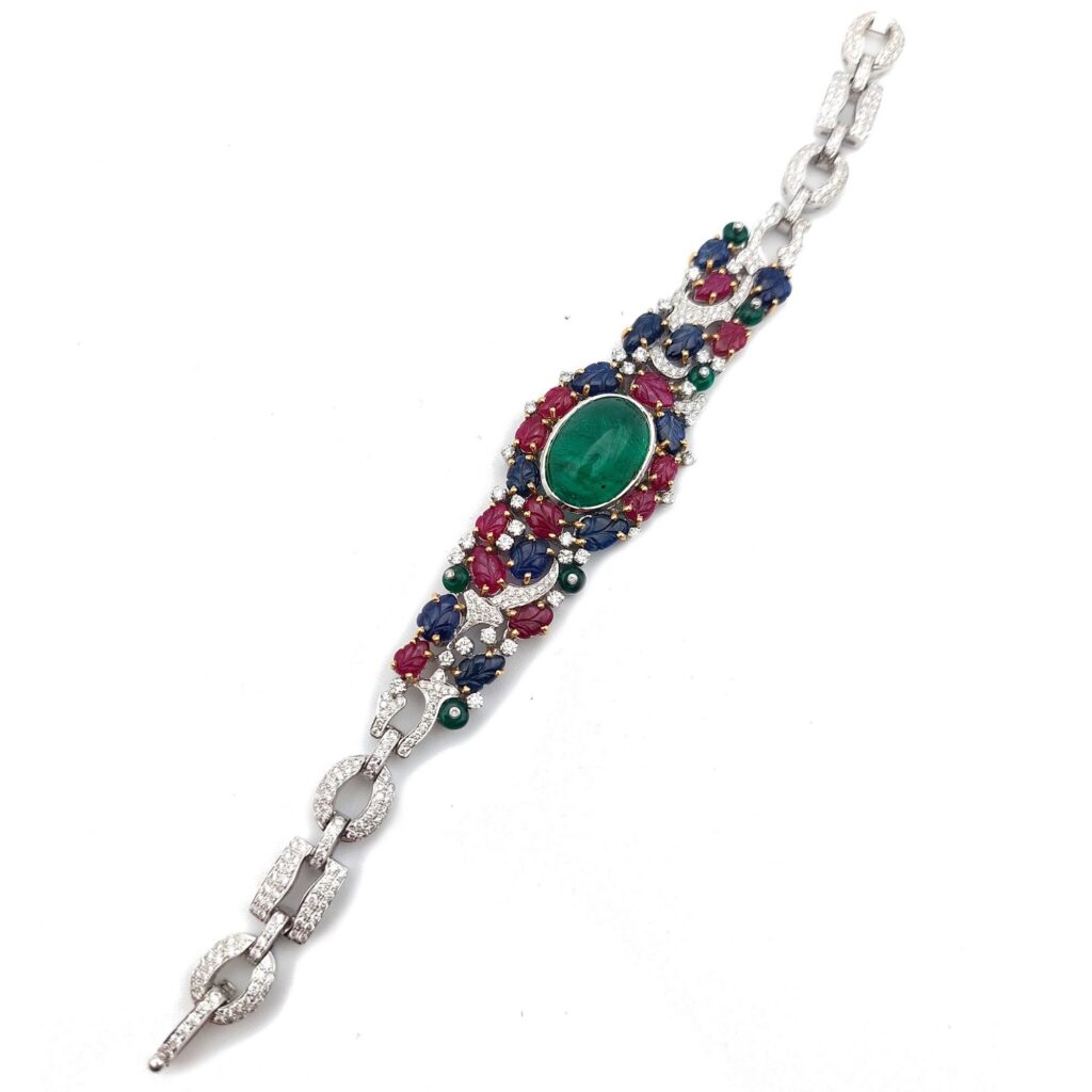 Bracelet Tutti Frutti "rêve indien", cabochon d'émeraude, rubis, saphirs et diamants, or 18k